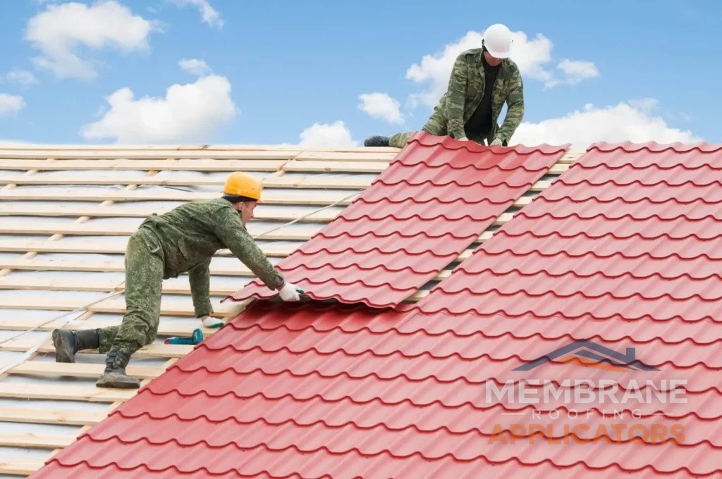 Metal roof installation in Christchurch - professional roofers working